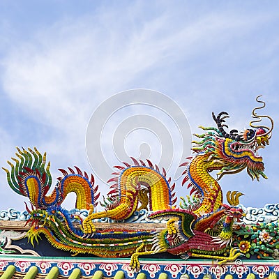 Chinese dragon on blue sky with cloud top Stock Photo