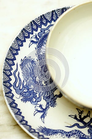 Chinese dragon blue white antique tea porcelain detail Stock Photo