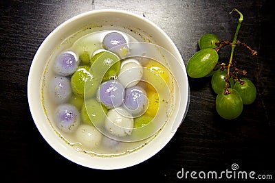 Chinese dumplings and grapes Stock Photo