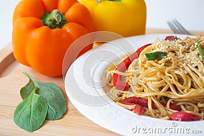 Chinese egg noodles in soy sauce Stock Photo