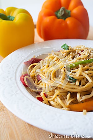 Chinese egg noodles in soy sauce Stock Photo