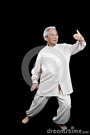 Chinese Elderly performing Tai Stock Photo