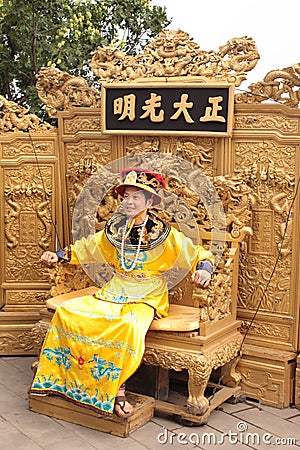Chinese emperor is siting on the throne Editorial Stock Photo