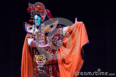 Chinese Face-changing performances. Spring Festival 2013 Editorial Stock Photo