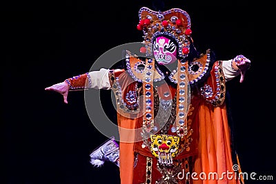 Chinese Face-changing performances. Spring Festival 2013 Editorial Stock Photo