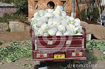 Chinese Farmer Selling Vegetables Editorial Stock Photo