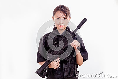 Chinese female police officer with assault rifle Stock Photo