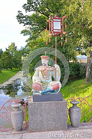 Chinese figure in traditional dress in Tsarskoe Selo. Editorial Stock Photo