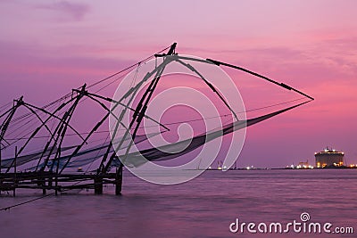 Chinese fishnets on sunset. Kochi, Kerala, India Stock Photo