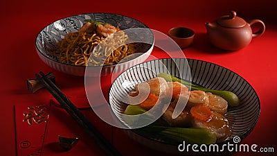 Chinese food. Homemade braise bean curd and shrimp chow mein Stock Photo