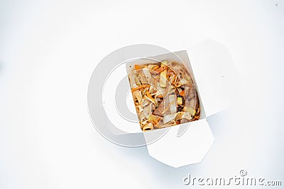 Chinese food on white background. Opened take away box Stock Photo