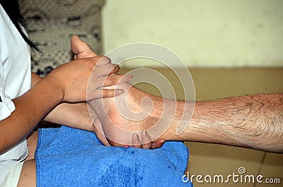 Chinese foot massage Stock Photo