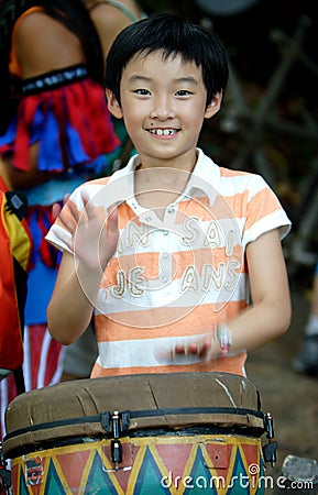 Chinese girl plays drum Stock Photo