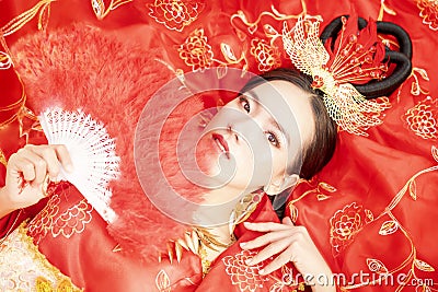 Chinese girl wearing Ancient chinese dress or Cheongsams dress Traditional Chinese dress, Asian female tourists, Chinese New Year Stock Photo