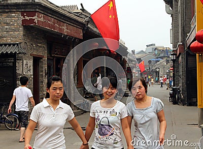 Chinese girls at Yandan Pipe hutong in Beijing, China Editorial Stock Photo