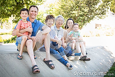 Chinese Grandparents, Mother, Caucasian Father and Mixed Race Family Stock Photo