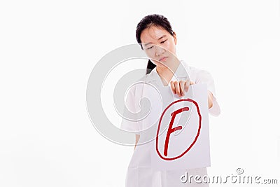 Chinese high school girl showing bad test score Stock Photo