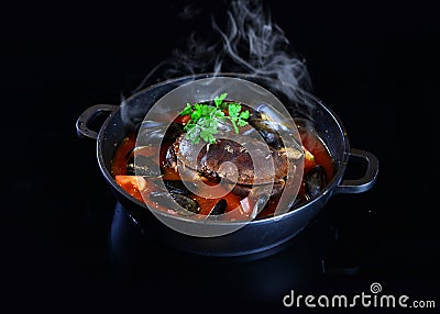 Chinese HotPot spicy soup base with crab and seafood Stock Photo