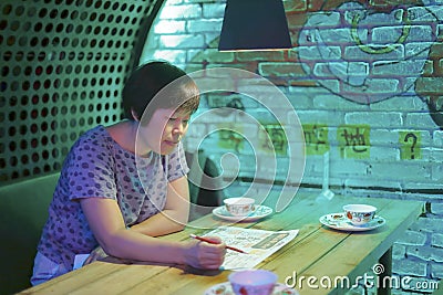 Chinese middle-aged woman order dishes Editorial Stock Photo