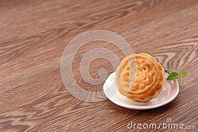 Chinese moon cake with vanilla -- food for Chinese mid- autumn festival isolated on white background Stock Photo