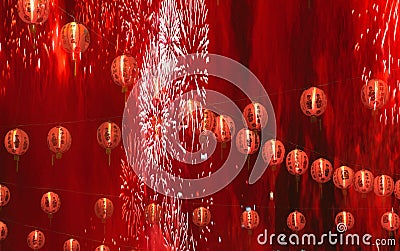 Chinese new year celebration background with lanterns and fireworks in red smoke Stock Photo