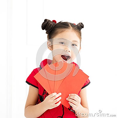 chinese new year. little girls holding red envelope Stock Photo