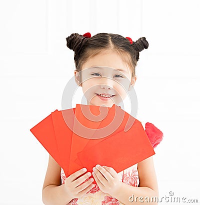 Chinese new year. little girls holding red envelope Stock Photo