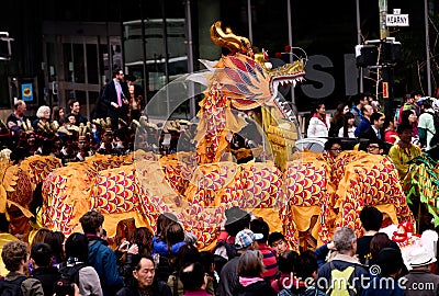 Chinese New Years Day Parade with colorful Dragon. Editorial Stock Photo