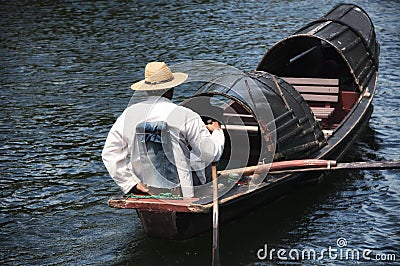 Wupeng Chuan black canopied boats east lake shaoxing china Editorial Stock Photo