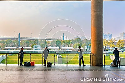 Chinese people waiting outside Shanghai south railway station Editorial Stock Photo