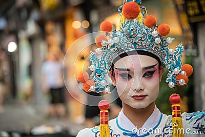 Chinese person in folk costume in Ci Qi Kou Ancient town in Chongqing Editorial Stock Photo