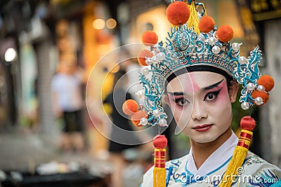 Chinese person in folk costume in Ci Qi Kou Ancient town in Chongqing Editorial Stock Photo