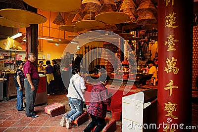 Chinese pilgrims praying, A-Ma Temple, Macau. Editorial Stock Photo