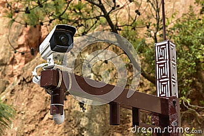 Chinese Surveillance Camera in a Park Editorial Stock Photo