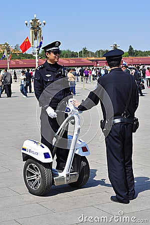 Chinese Police on patrolling Tiananmen with segway Editorial Stock Photo