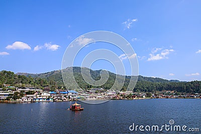 Chineses raft cruises on the lake Stock Photo