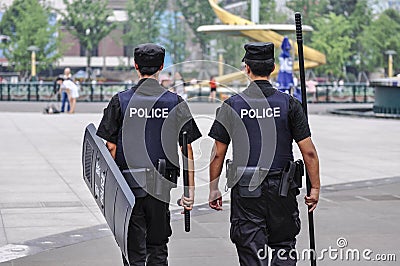 Chinese riot police move in patrols. Editorial Stock Photo