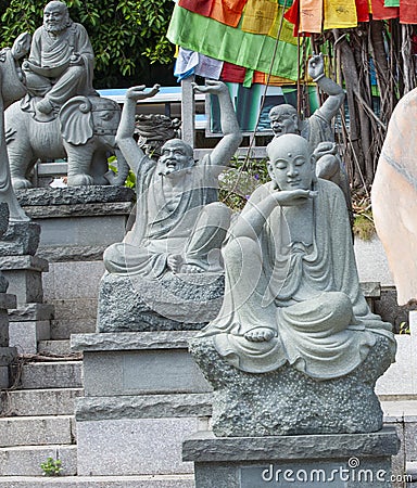 The Chinese sculpture in the garden of the temple Editorial Stock Photo