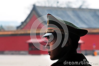 Chinese soldier guards inside the Forbidden City in Beijing Chin Editorial Stock Photo