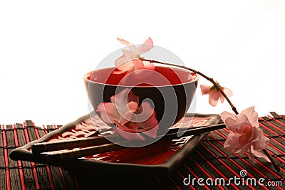 Chinese sticks, plate and cup Stock Photo