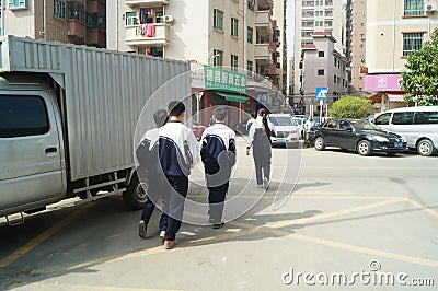 Chinese students go home from school Editorial Stock Photo