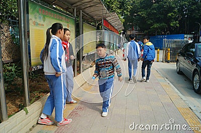 Chinese students go home from school Editorial Stock Photo