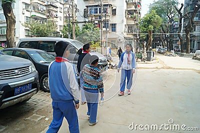 Chinese students go home from school Editorial Stock Photo