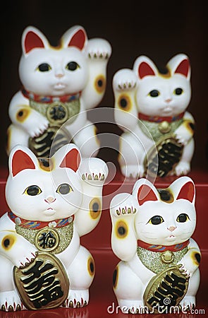 Chinese talisman cat figurines Stock Photo