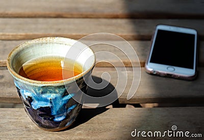 Chinese tea served in traditional handcraft Japanese ceramic pottery Stock Photo