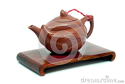 Chinese Teapot on stand in white background Stock Photo