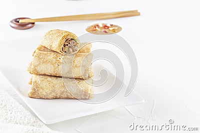 Chinese tortillas - bings in plate on a white background. Stock Photo