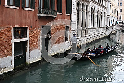 Chinese Tourism sailing travel by Gondola at Grand Canal Venice surrounding by historical attractive building, Venice, Italy Editorial Stock Photo