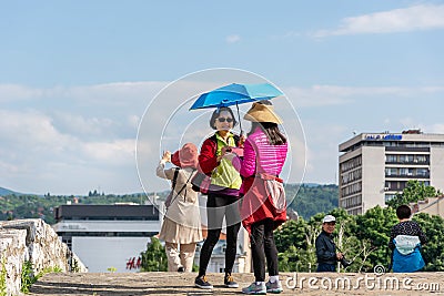 Capturing Memories: Chinese Tourists Immersed in the Beauty of Medieval City-Fortress in Nis, Serbia Editorial Stock Photo