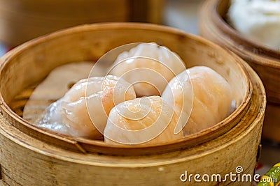 Chinese traditional prawn dumpling in a bamboo basket Stock Photo